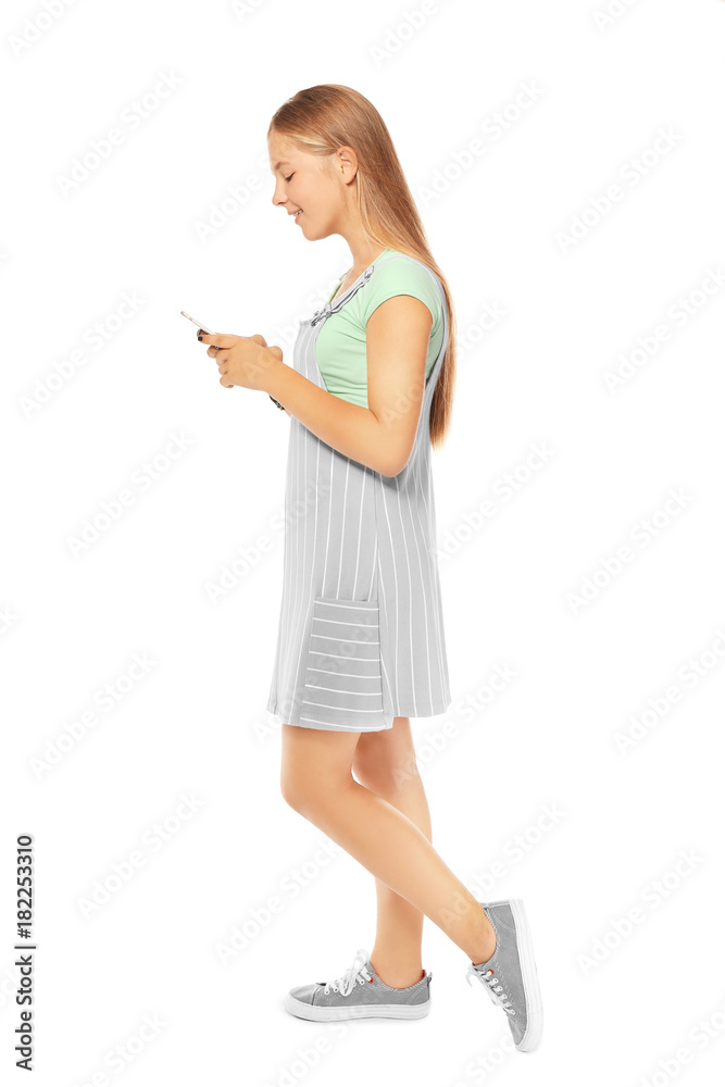 Cute teenager girl with mobile phone on white background Cute teenager girl with mobile phone on white background