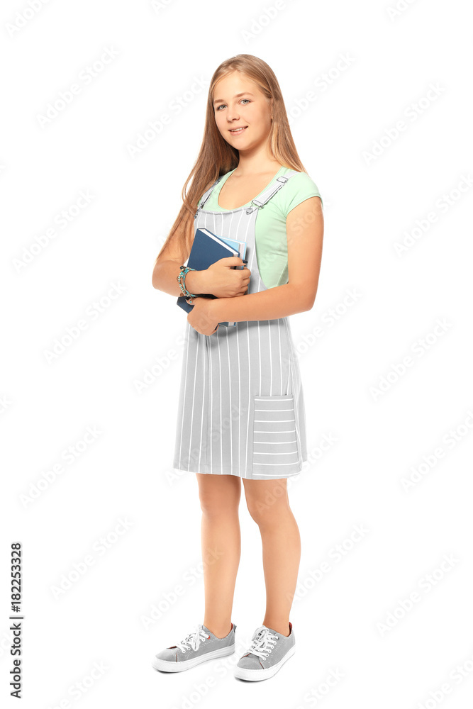 Cute teenager girl with books on white background Cute teenager girl with books on white background