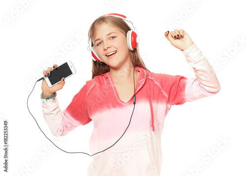Cute teenager girl listenin...