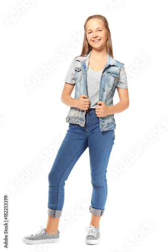 Cute teenager girl on white...