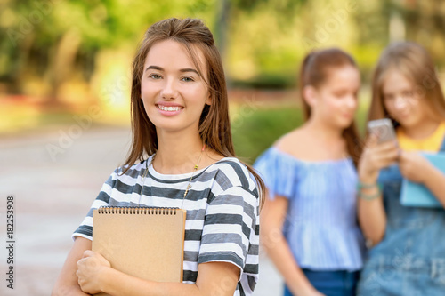 Cute teenager girl with not...