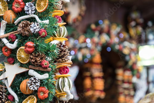 Christmas dry fruits decorations at a Christmas market © Curioso.Photography