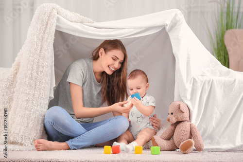 Young mother and cute baby ...