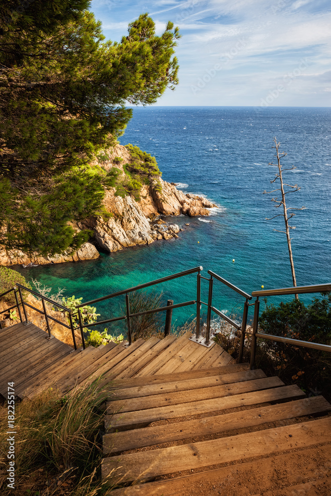 Fototapeta premium Wooden Stairs To The Sea on Costa Brava in Spain
