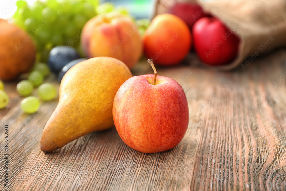 Fresh fruits on wooden table Fresh fruits on wooden table