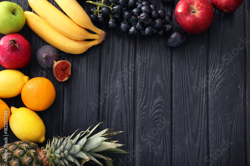 Fototapeta Naklejka Na Ścianę i Meble -  Fresh fruits on wooden background