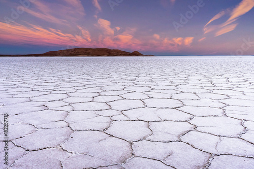 Sunset Salt Flats in Salar de Uyuni Desert Bolivia photo