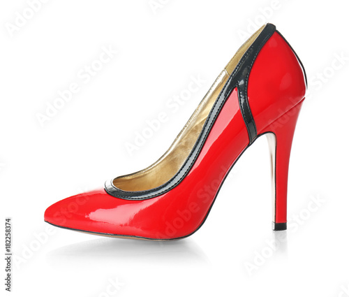Red female high-heel shoe on white background