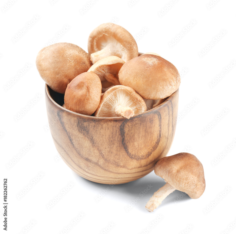 Raw shiitake mushrooms in bowl, isolated on white Raw shiitake mushrooms in bowl, isolated on white