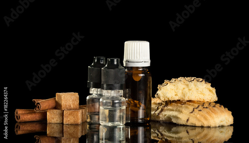 The bottle of liquid for Smoking, candy and cookies, isolated on black