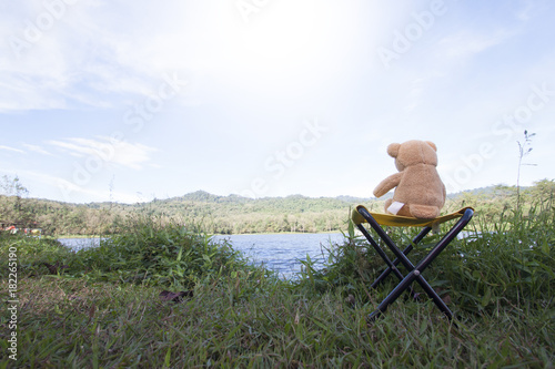 Landscape Mountain river view with bear on the chair of Ched Khot - Pongkonsao Natural Study & Eco Center in Saraburi Province Thailand  photo