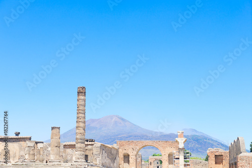 ruins of Pompeii with Vesuveus volcano in background, Italy
