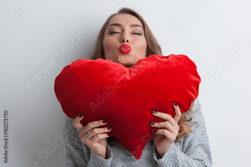 Woman with pillow heart