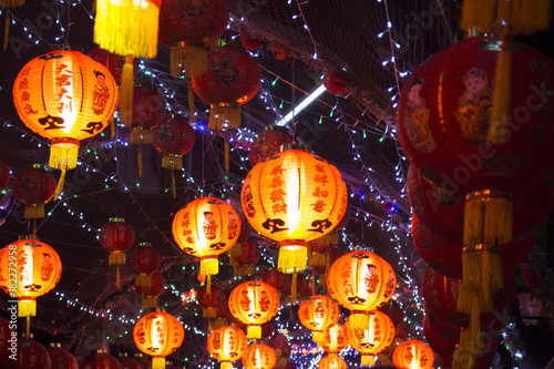 Chinese lanterns at night , Chinese New Year decorations (text means good luck)