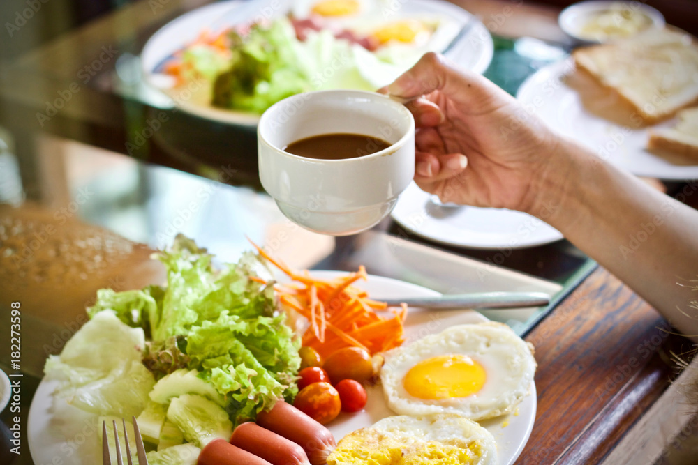 Coffee cup and food breakfast in the morning Coffee cup and food breakfast in the morning