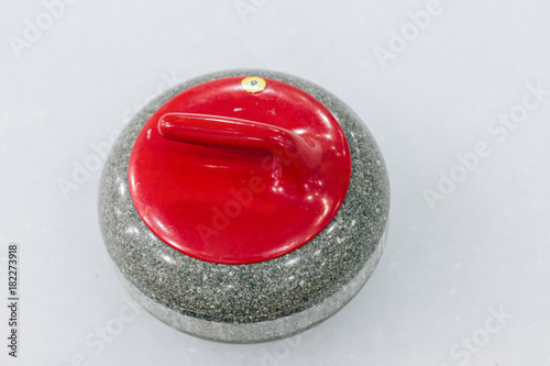 Red Granite stone for curling game. Sport equipment