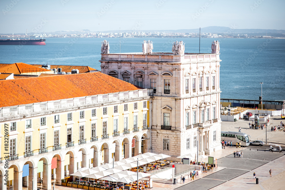 Top view on the Commerce square with Administration building tower in the centre of Lisbon city during the sunny day in Portugal
