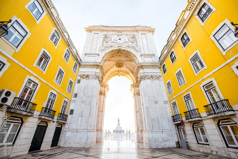 Triumphal arch on the Commerce square during the sunrise in Lisbon city, Portugal