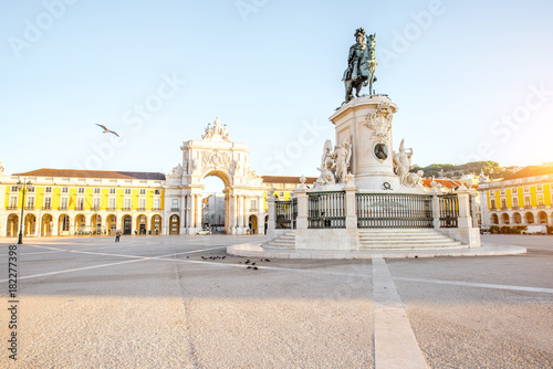 Morning view on the Commerce square with statue fo king Joseph and Triumphal arch in Lisbon city, Portugal
