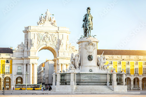 Morning view on the Commerce square with statue fo king Joseph and Triumphal arch in Lisbon city, Portugal