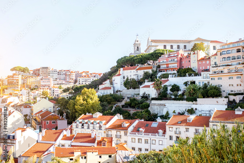 Cityscape view on the old town with Graca church near the castle hill in Lisbon city, Portugal