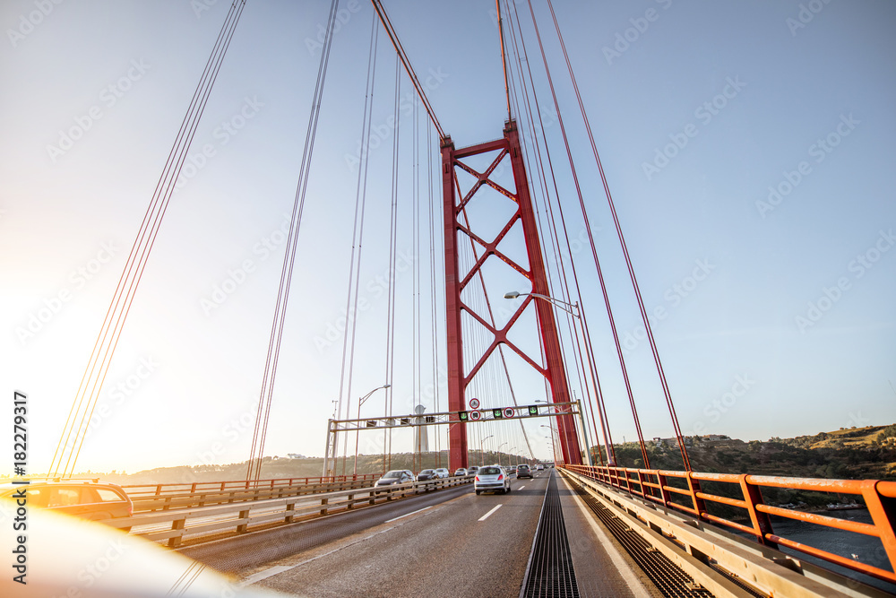 Driving on the famous 25th of April bridge in Lisbon city, Portugal