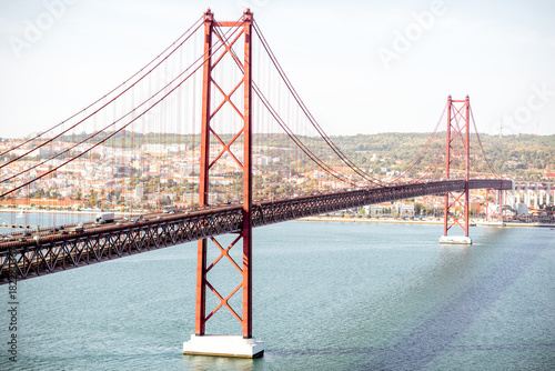 Landscape view on the Tagus river and the famous 25th of April Bridge in Lisbon city, Portugal