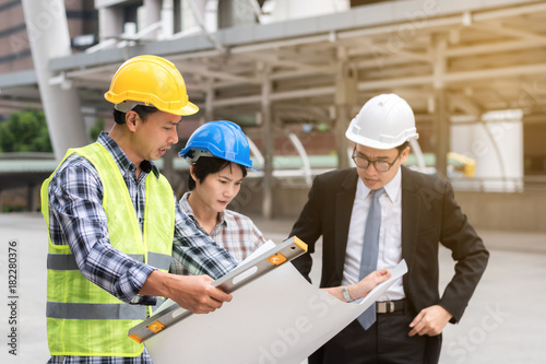 engineering construction concept : professional engineer team meeting foreman group plan manufacturing industry