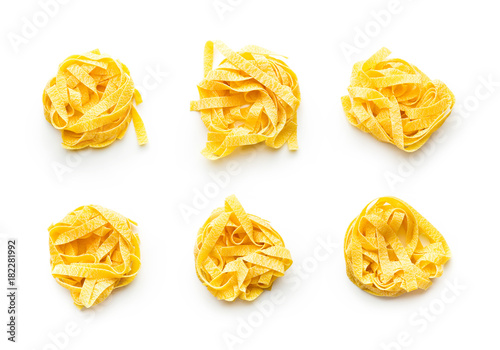 Raw tagliatelle pasta.