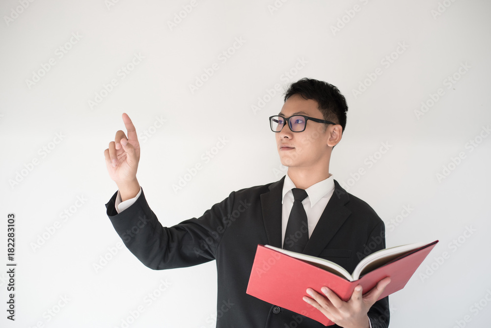 Beautiful business man reading a book with idea Beautiful business man reading a book with idea