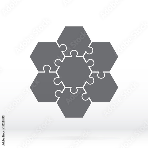Simple icon hexagonal puzzles in gray. Simple icon puzzle of the seven elements. Flat design. Vector illustration EPS10.