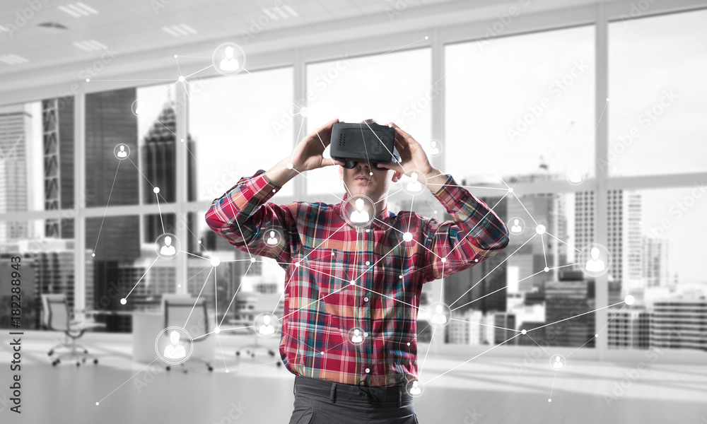 Fototapeta premium Guy wearing checked shirt and virtual mask demonstrating some emotions