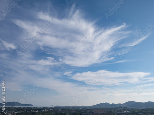 blue cloudy sky background and mountain