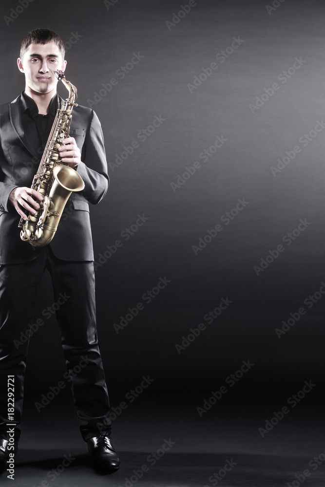 Naklejka premium Saxophone player Jazz musician saxophonist