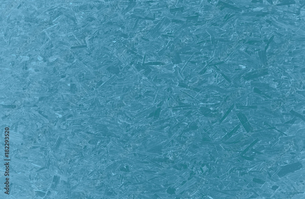 Light pastel blue particle chip board desk surface background Light pastel blue particle chip board desk surface background