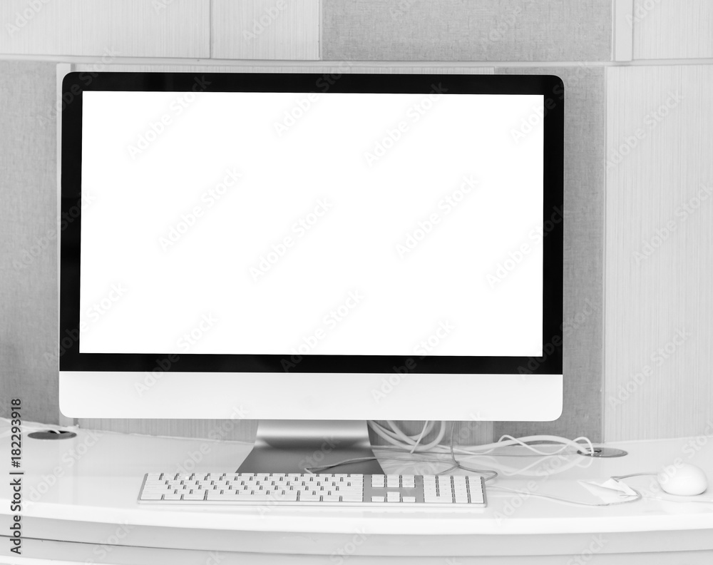 Fototapeta premium Blank screen computer desktop with keyboard and mouse on working table