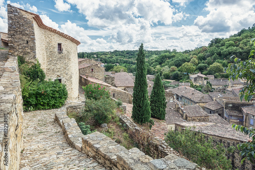 Top view of the rooftops of the village Saint Montan with the remains of an old city wall