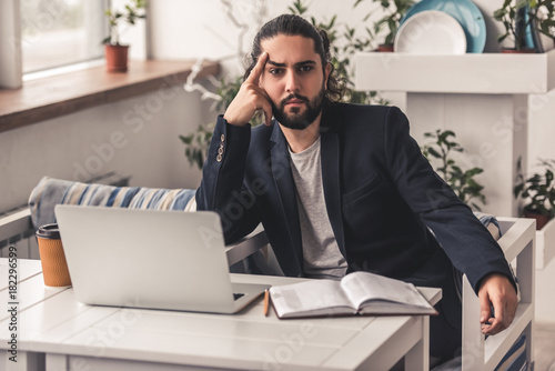 Stylish guy working