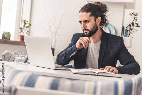 Stylish guy working