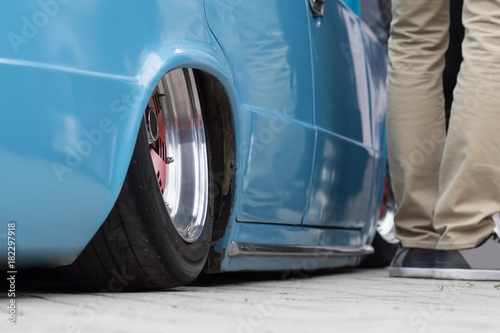 classic car with low ground clearance on the show