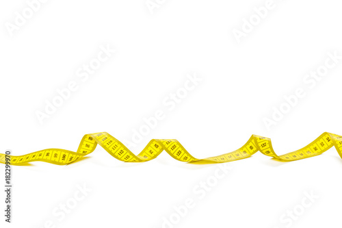 yellow metric measuring tape isolated on white panorama background