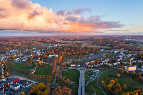Aerial view of the city at sunset. Beautiful autumn city landscape.