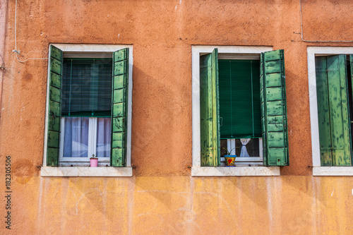 Beautiful colorful house facade on Venice, Italy. 