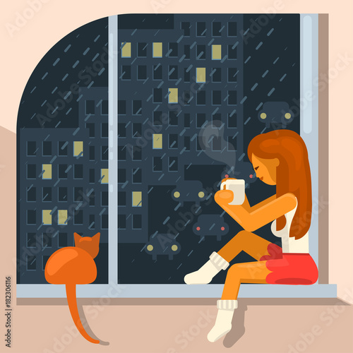 girl sits on the windowsill