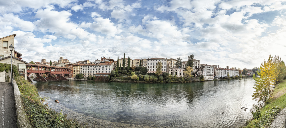 Fototapeta premium Bassano del Grappa with river Brenta and bridge Ponte Alpini
