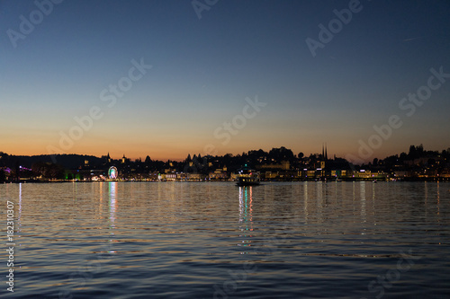 sunset at lake lucerne with city panorama and water reflection popular tourist destination in switzerland