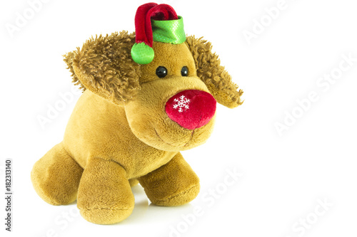 Toy dog, New Year's gift from Santa Claus. Isolated white background. photo