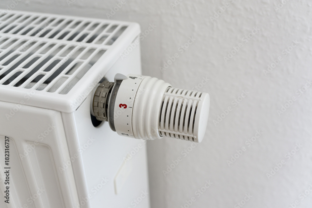 thermostatic valve on radiator close up thermostatic valve on radiator close up