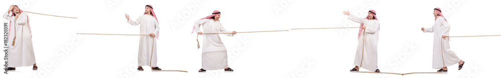 Arab in tug of war concept on white Arab in tug of war concept on white