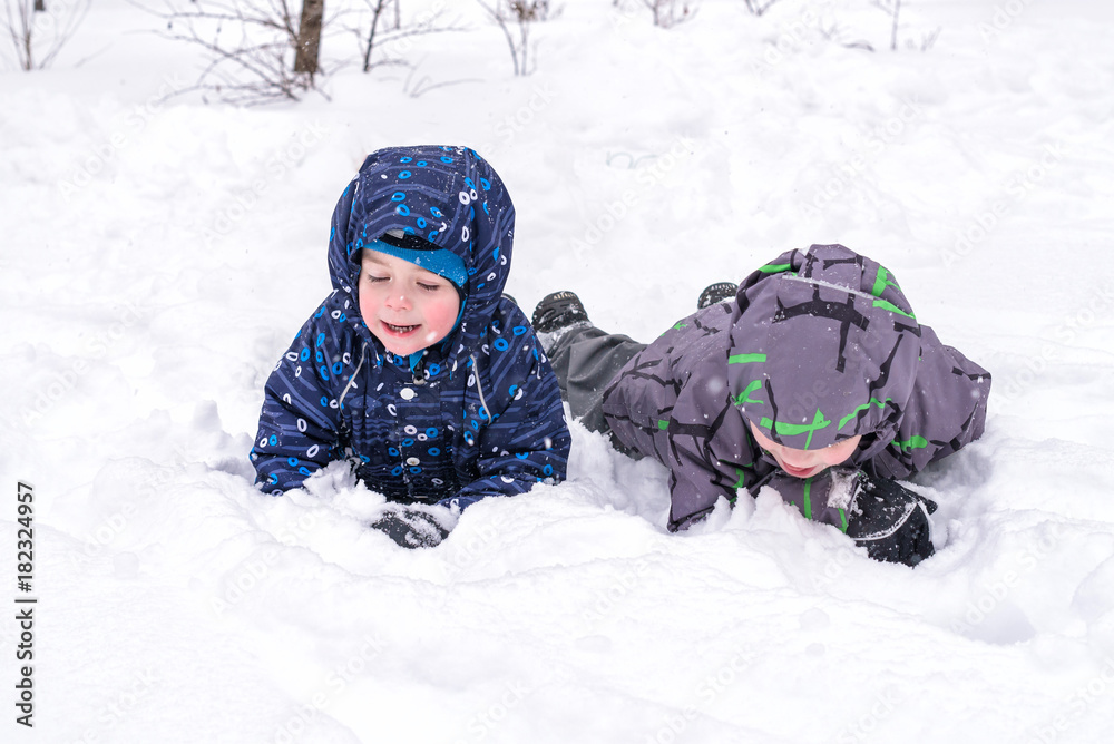 Happy friends having fun with snow Happy friends having fun with snow